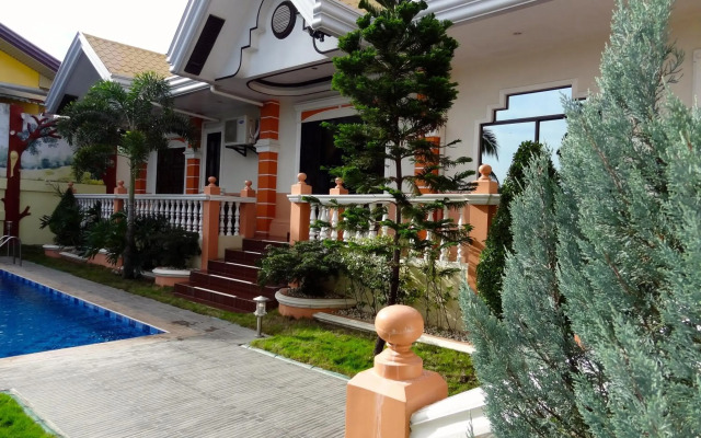 The Executive Villa Inn & Suites