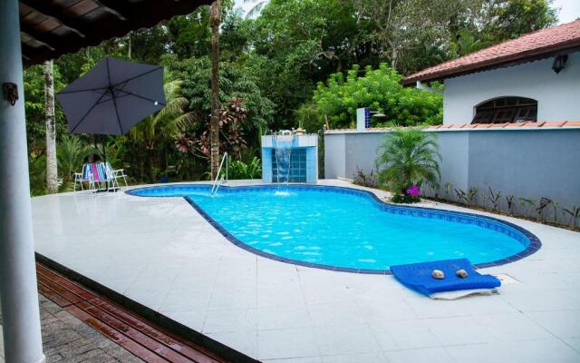 Linda casa com lazer a 500m da praia Guaratuba SP
