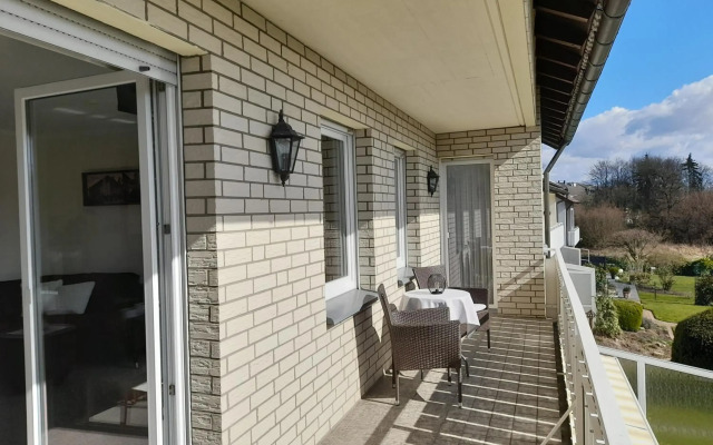 Ferienwohnung und Gästezimmer Iburgblick