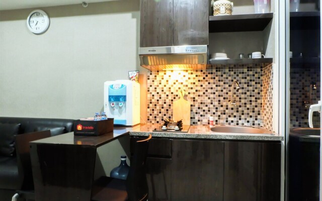 Pool View Green Pramuka Apartment