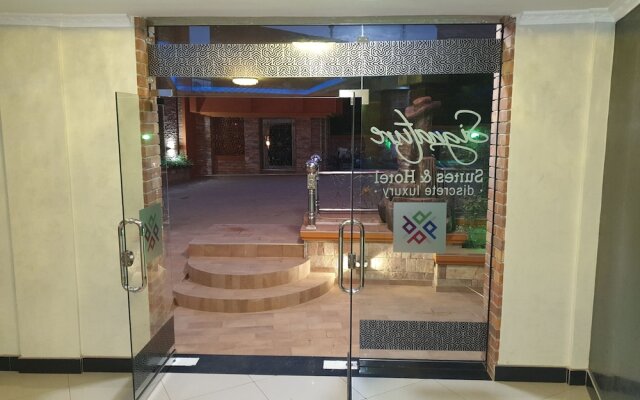 Signature Suites & Hotel
