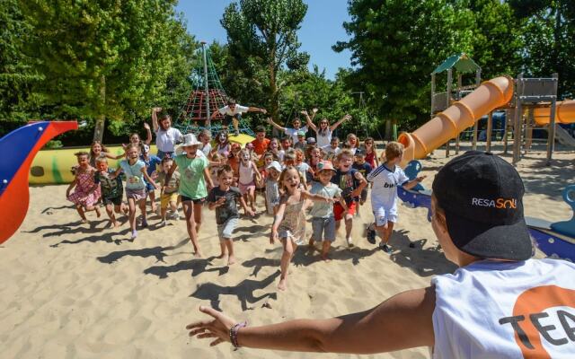 Cozy Mobile Home With Covered Terrace on a Luxury Campsite
