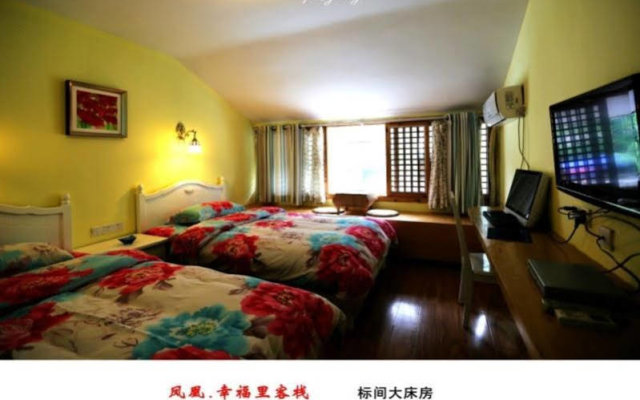 Fenghuang Happy Hotel