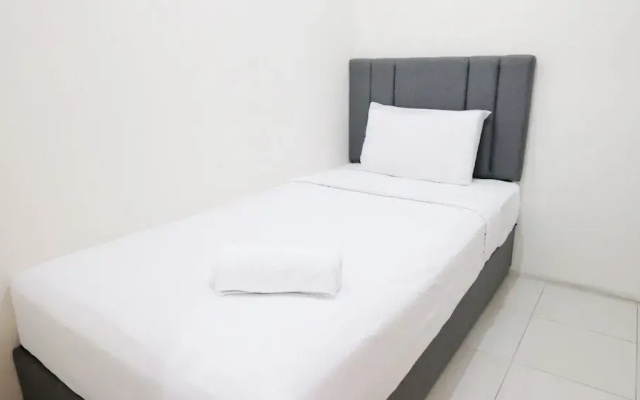 Homey 2Br At Puncak Permai Apartment
