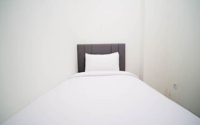 Cozy Living And Tidy 2Br At Puncak Dharmahusada Apartment