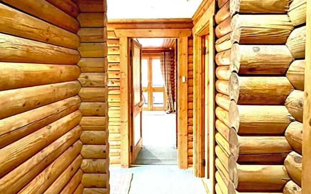 Riverside log cabins