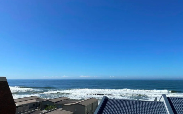 Beach front, two story condo