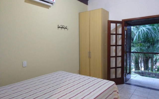 Casa 5 suítes com piscina e churrasqueira