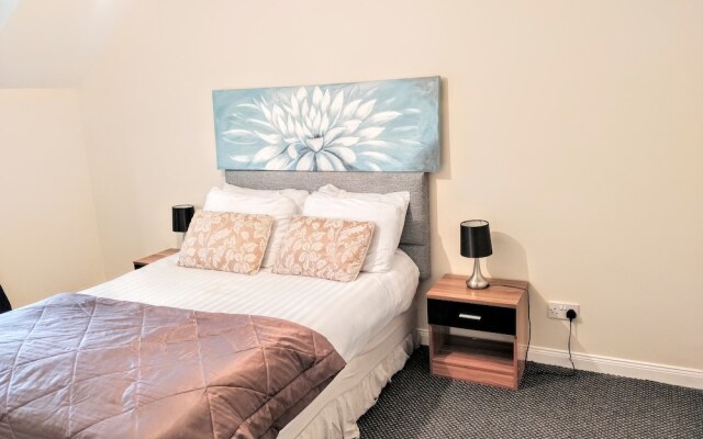 Millie and Charley's Apartments