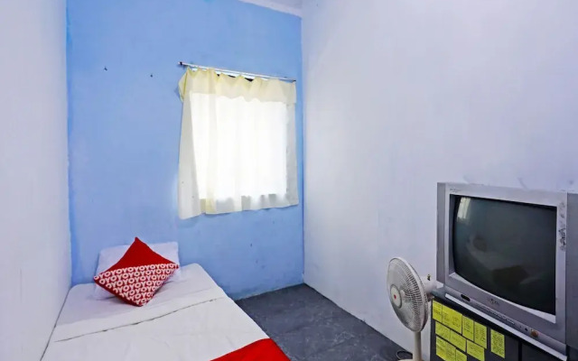 SPOT ON 91591 Rafika Homestay SyariahNearTempat Makan Pagi Sore Nohil