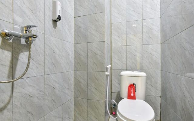 RedDoorz Plus near TIS Square