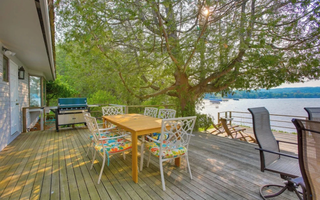 Tennis Court & 500' of Waterfront: Suttons Bay Gem