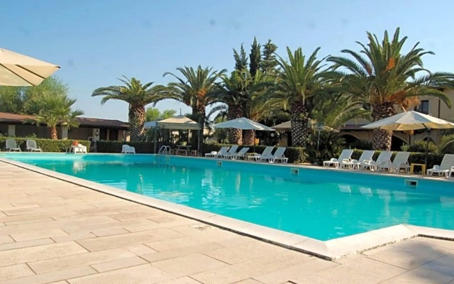 Inviting Holiday Home in Trinitapoli with Swimming Pool