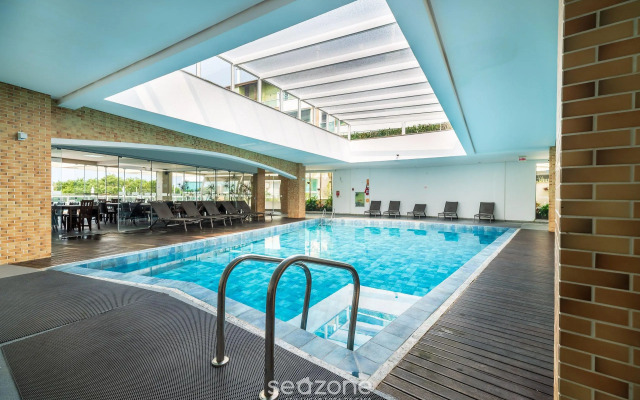 Apto beira mar com vista Praia do Santinho ASR204