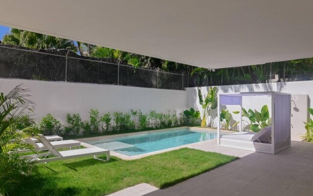 Modern and Spacious Condo Steps From the Beach