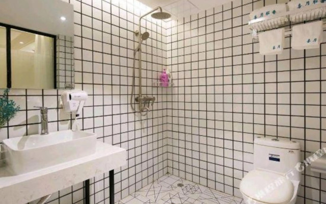 Xiyue Light Luxury Inn (Helong Gymnasium People's Hospital)