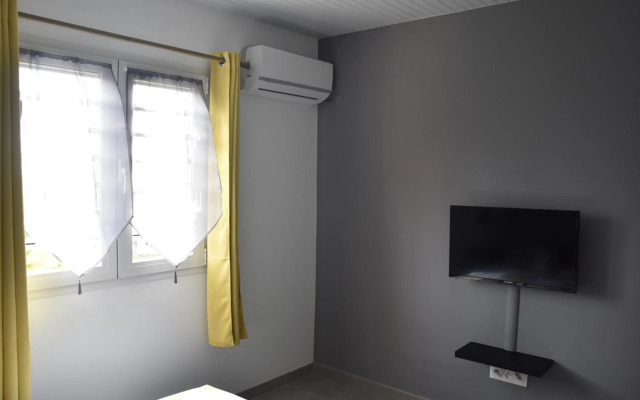 Haut de villa dans son écrin de verdure