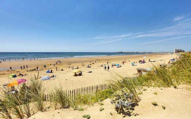 Une sympathique maison de vacances aux volets bleus