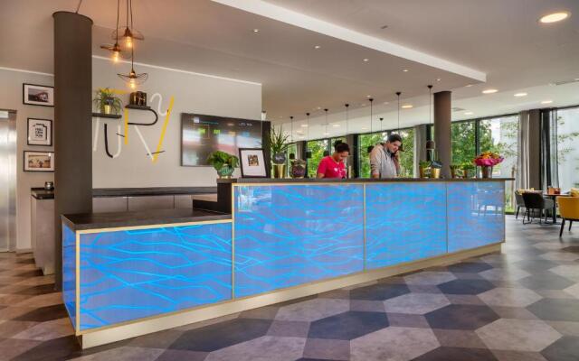 Holiday Inn - the niu, Fury Aschheim Messe by IHG