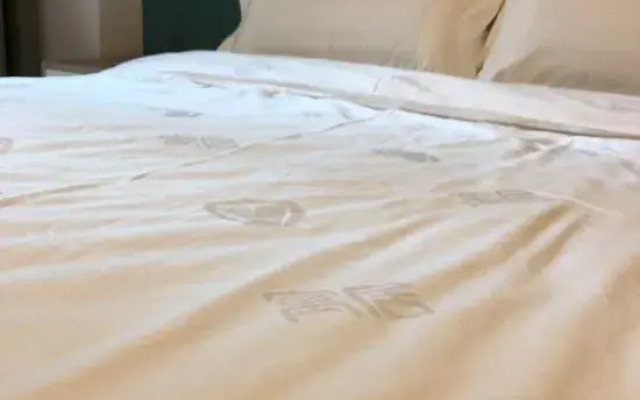Yu Life Service Apartment (Chongqing Olympic Sports Center)