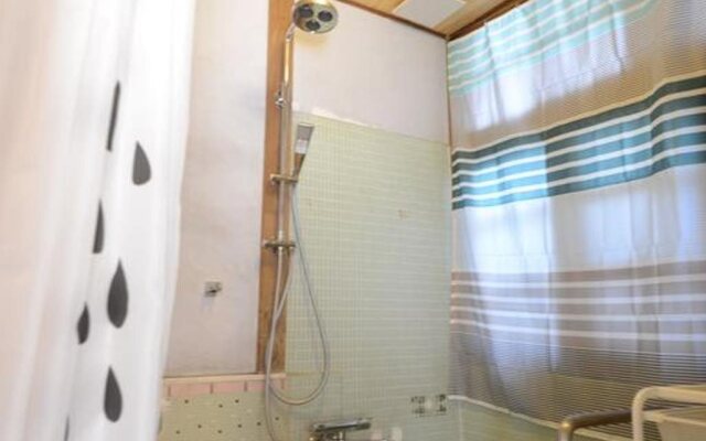 Taketa station hostel cue