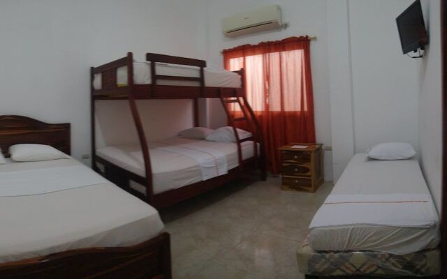 Hostal Palmeras Playa Milina