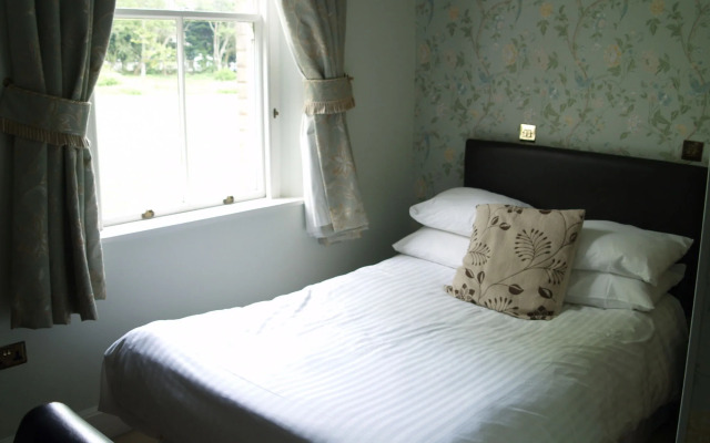 Woodland Manor Hotel