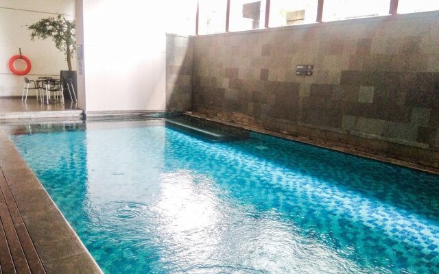 Cozy and Elegant 2BR Kemang Village Apartment By Travelio