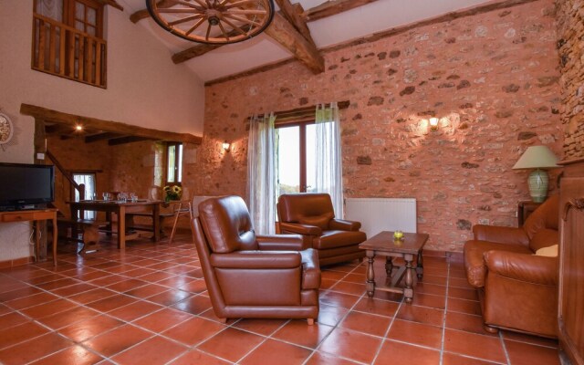 Lovely holiday home in Biron with fenced swimming pool