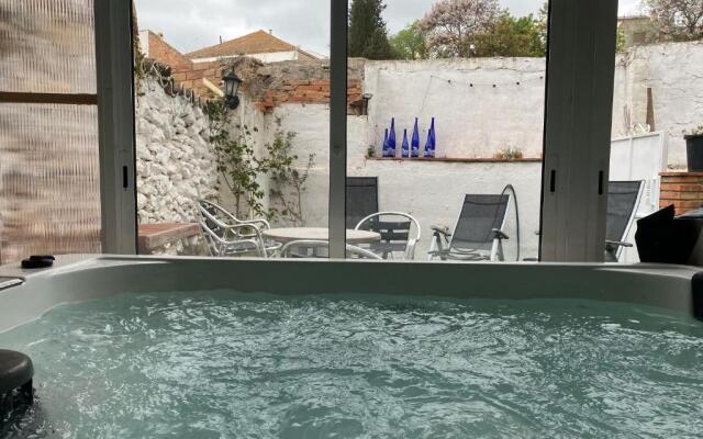 La Olivera APARTHotel Rural Suites bañera hidro o Jacuzzi privados