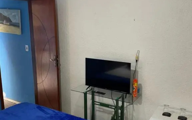 Suíte com varanda vista piscina