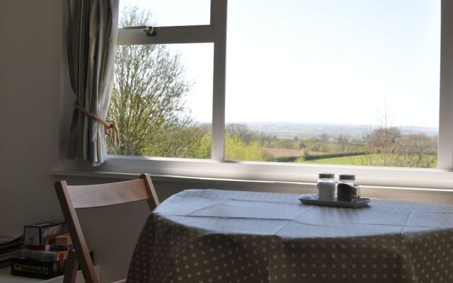 Cosy and Rural Lodge at Goldhill Glamping