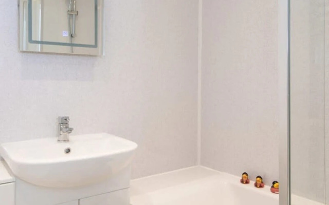 Absolute Beachfront With Decked Garden Oasis and Views