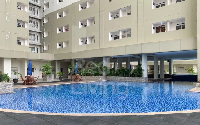 RedLiving Apartemen LoftVilles City - Pelangi Rooms