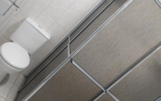 Apartamento Centro de Bertioga 100MTS da praia.