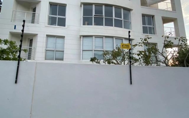 Cozy two bedroom unit in Strand with pool gym and laundromat