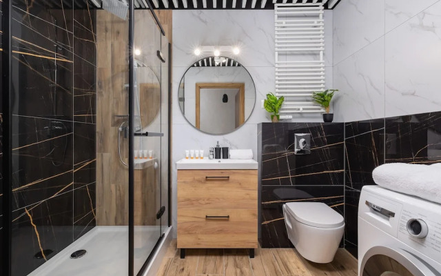 Dark Blue Apartment in Kraków by Renters