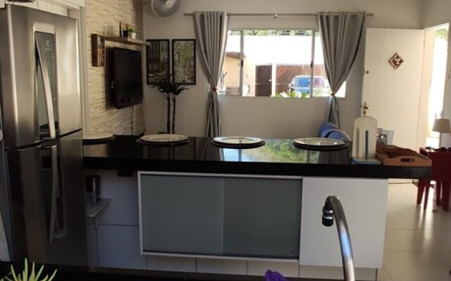 Casa com piscina em Caraguatatuba