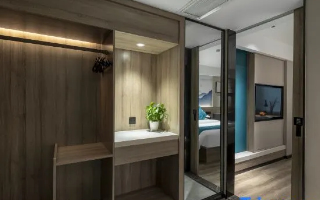 Qianyi Hotel (Beiliu Wanda Plaza Branch)
