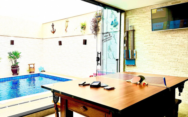 Piscina com ofurô/Churrasqueira/Sinuca e Ping Pong