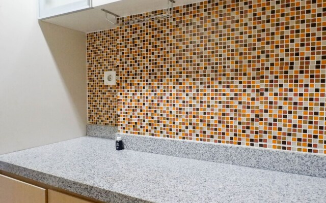 Homey And Serene Studio Apartment At Tamansari Papilio