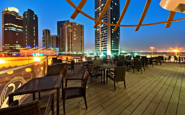 Magnum Hotel & Suites West Bay