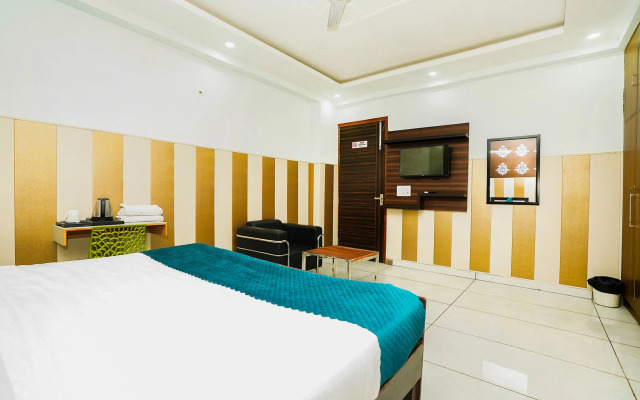 Fabhotel Tanvi Premium