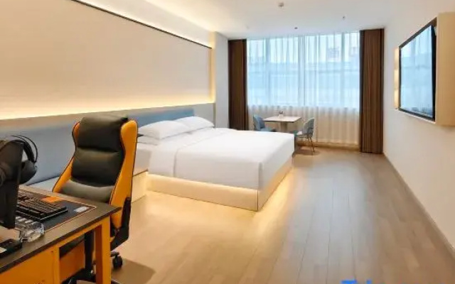 Jingfang E-Sports Hotel (Xuanhan Baren Square)