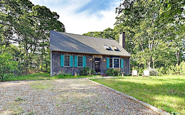 Woodsy Cape Cod Home by RedAwning