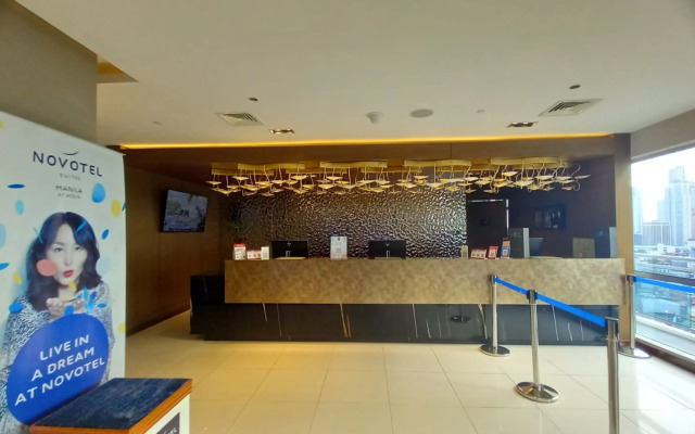 Capital O 950 Acqua Novotel Tower
