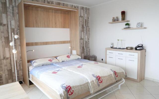 FeWo Tietjen, mit Meerblick, Strandhochhaus F9