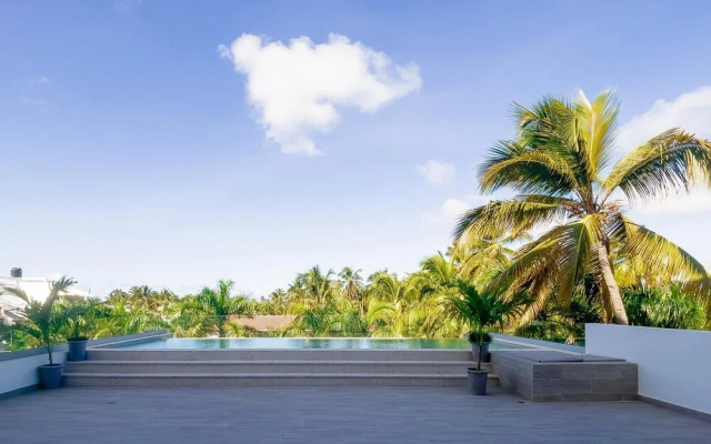 Beach Vacation at This Modern Apartment