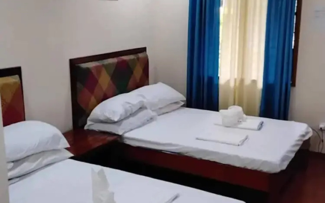 Room-serene Family Haven in Mambajao, Ph