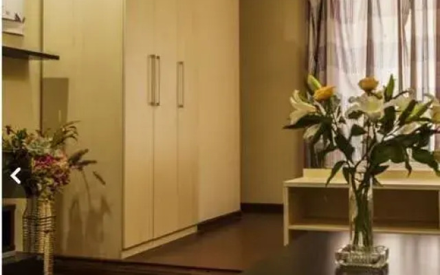Ai Ke Jia Hotel Apartment